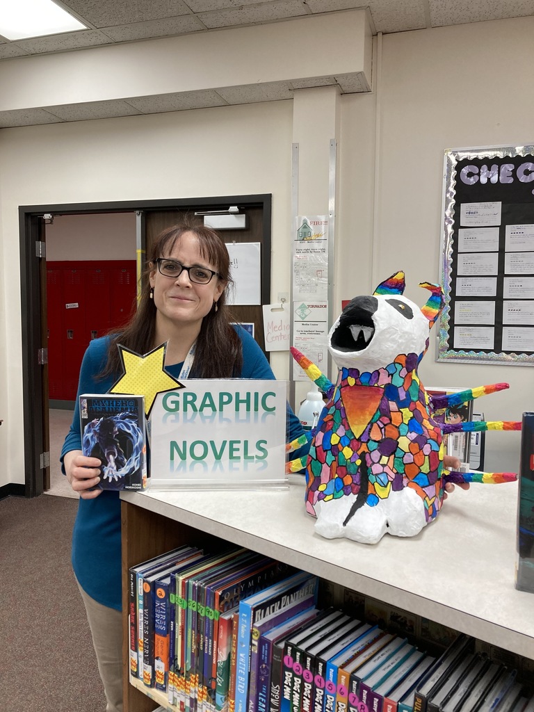 Mrs. Wickline poses for a picture in the TMS Media Center.
