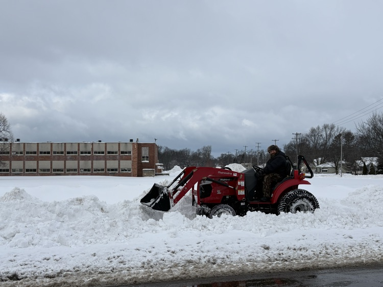 Ray clearing the sidewalks