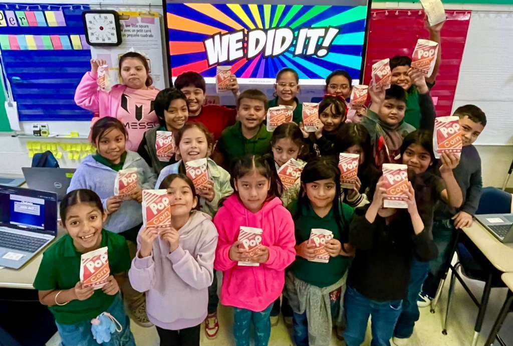 kids holding their popcorn