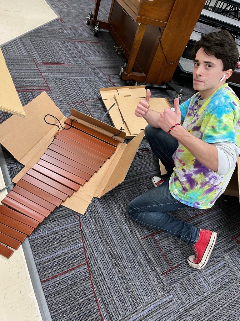 A THS student gives a thumbs up.