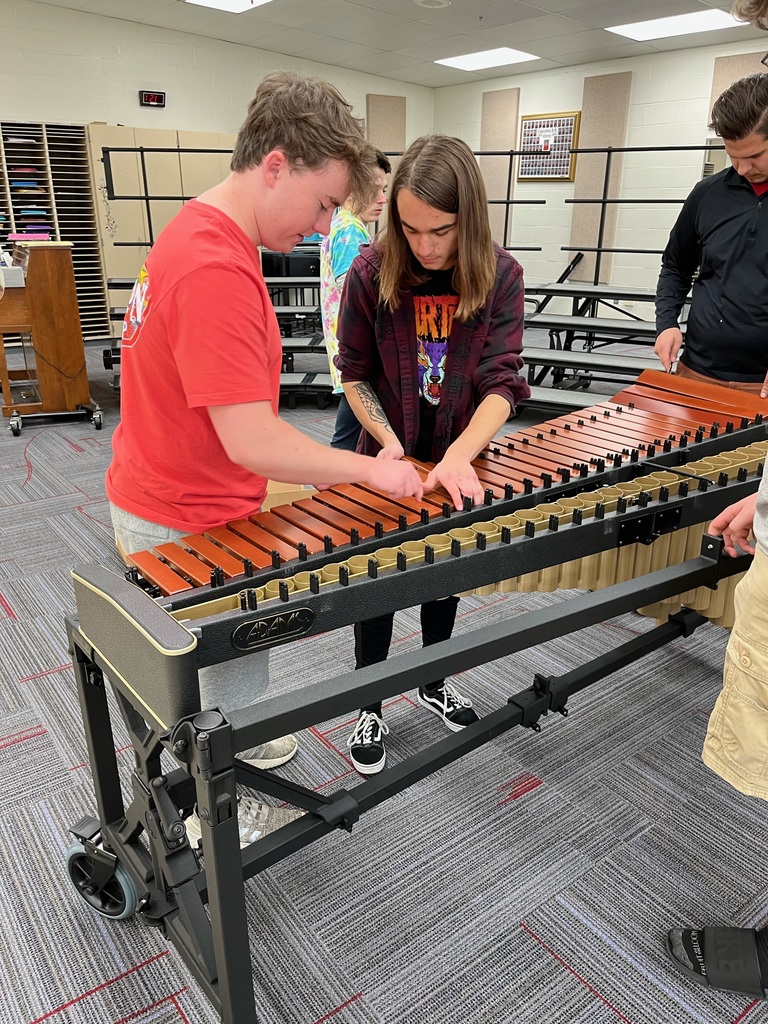 THS students assemble the Marimba they just received thanks to a grant from Tipp Foundation.