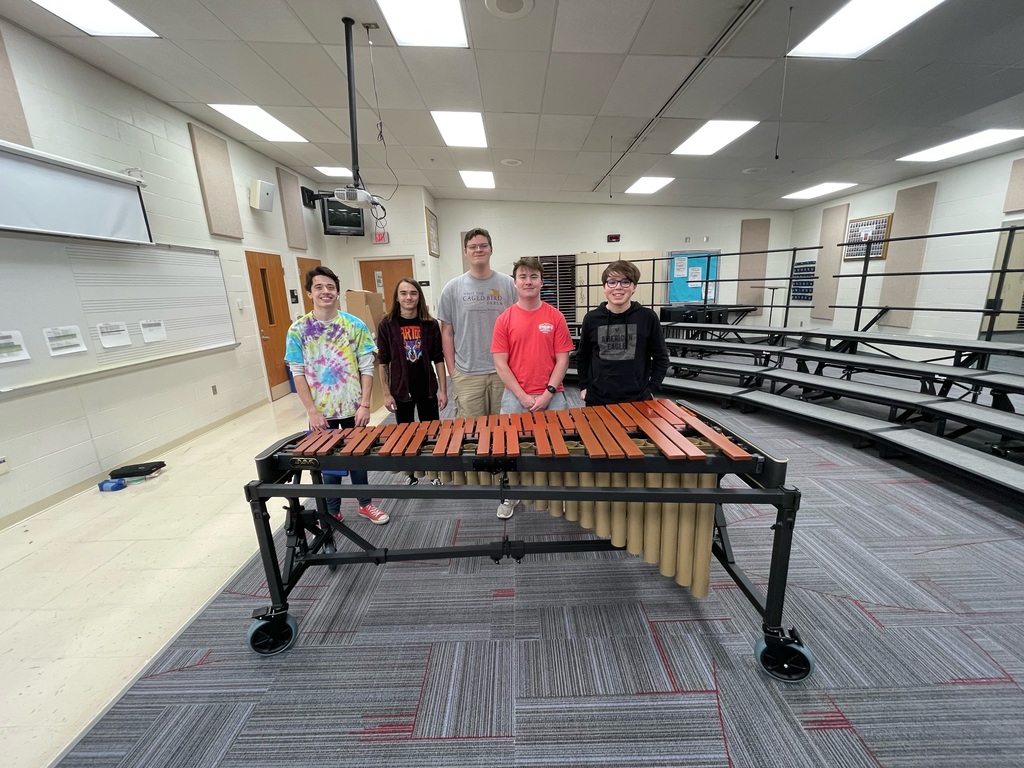 THS band students pose behind the Marimba.