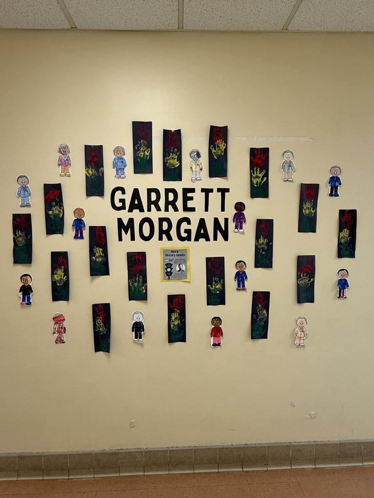 A wall that has colorful art on it and says Garrett Morgan.