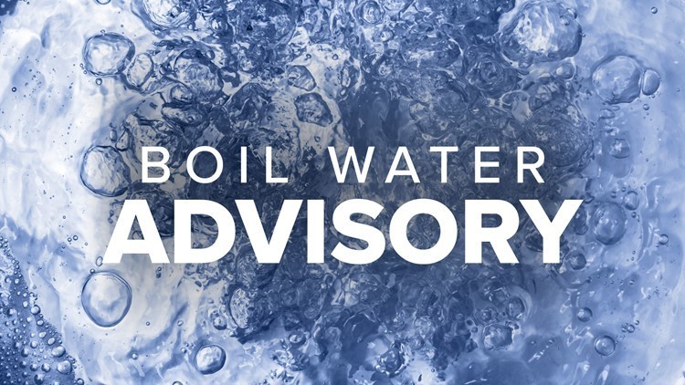 white letters stating boil water advisory on water bubble background