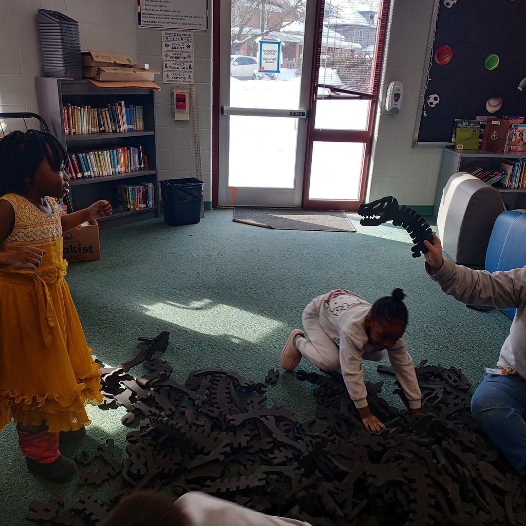 Kids playing in a library.