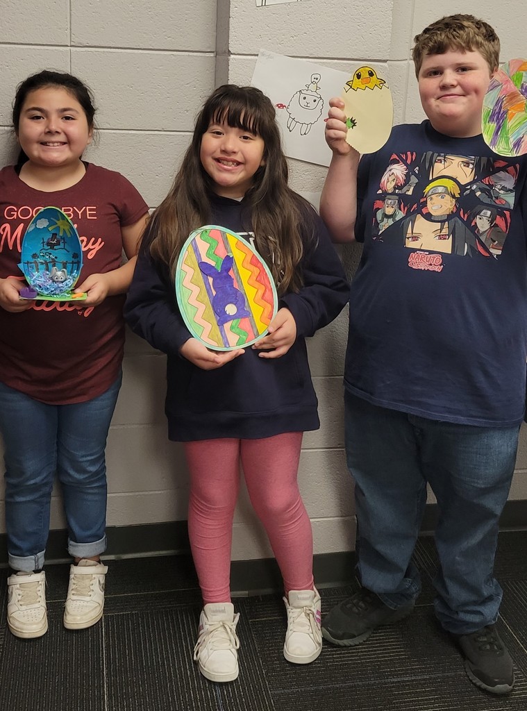 students with egg artwork