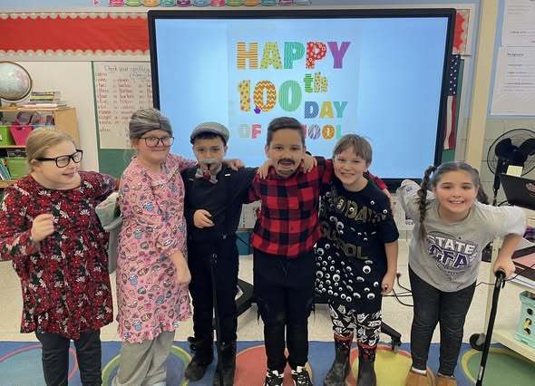 A group of kids dressed up as old people.