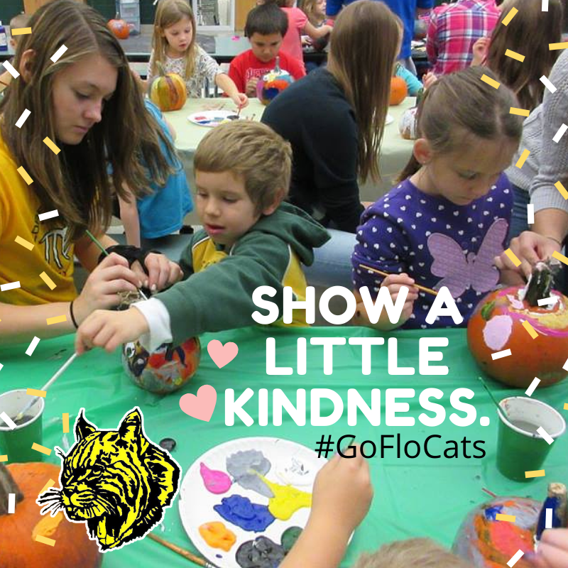 Show a little kindness. Florence HS students helping Elementary student
