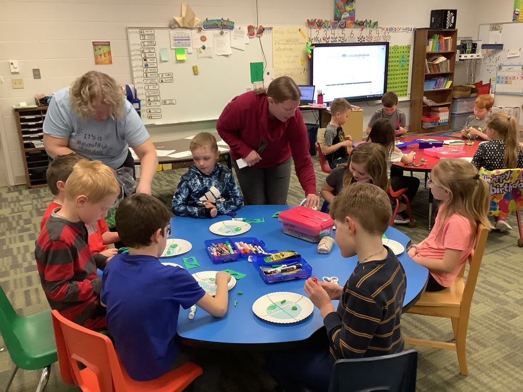 1st graders working on butterfly lifecycle project