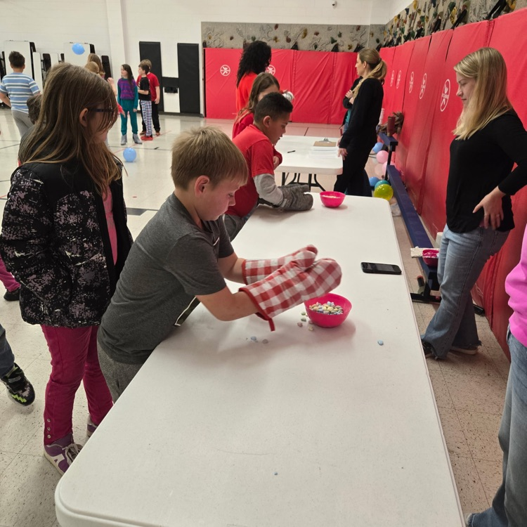 Photos show students playing Valentine’s Day games  