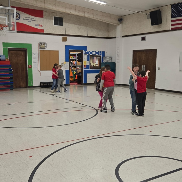 Photo shows students playing Valentine’s Day games. 
