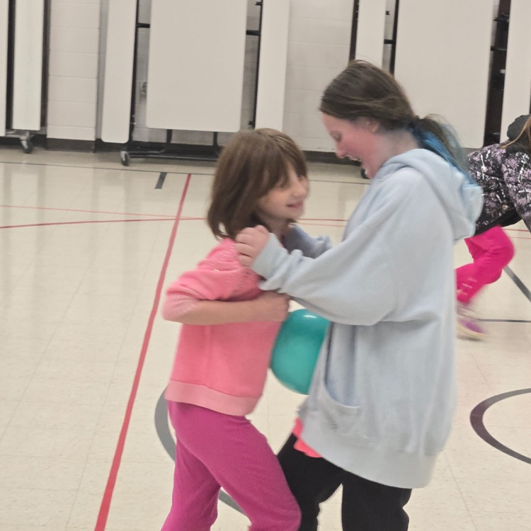 Photo shows students playing Valentine’s Day games. 