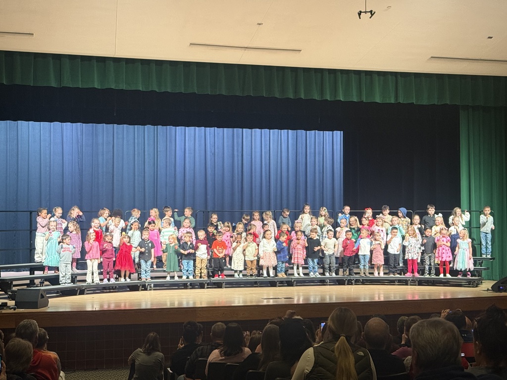 Photo of preschoolers performing at their winter concert.