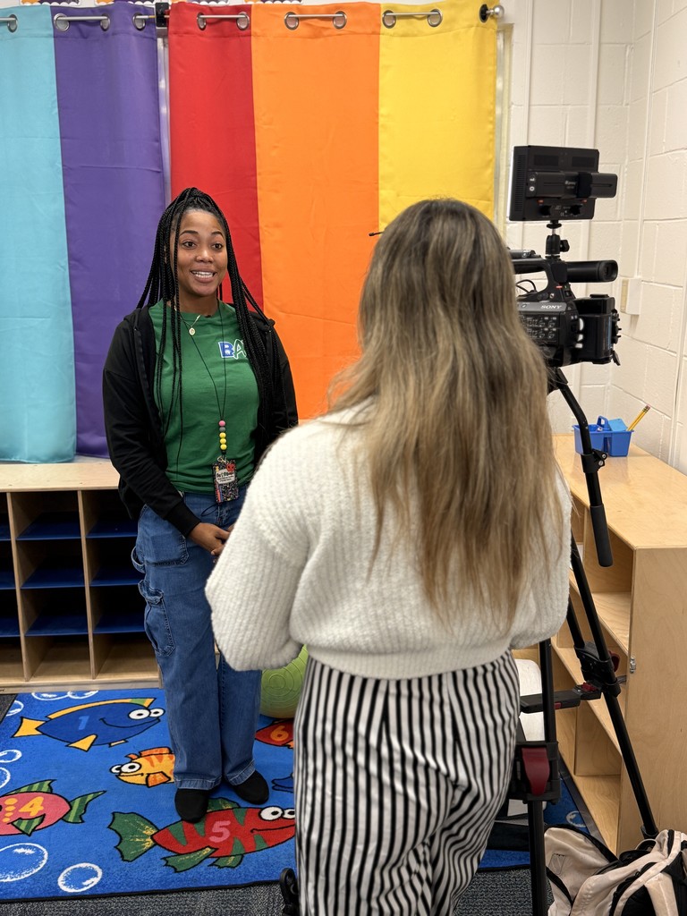Ms. Robinson being interviewed