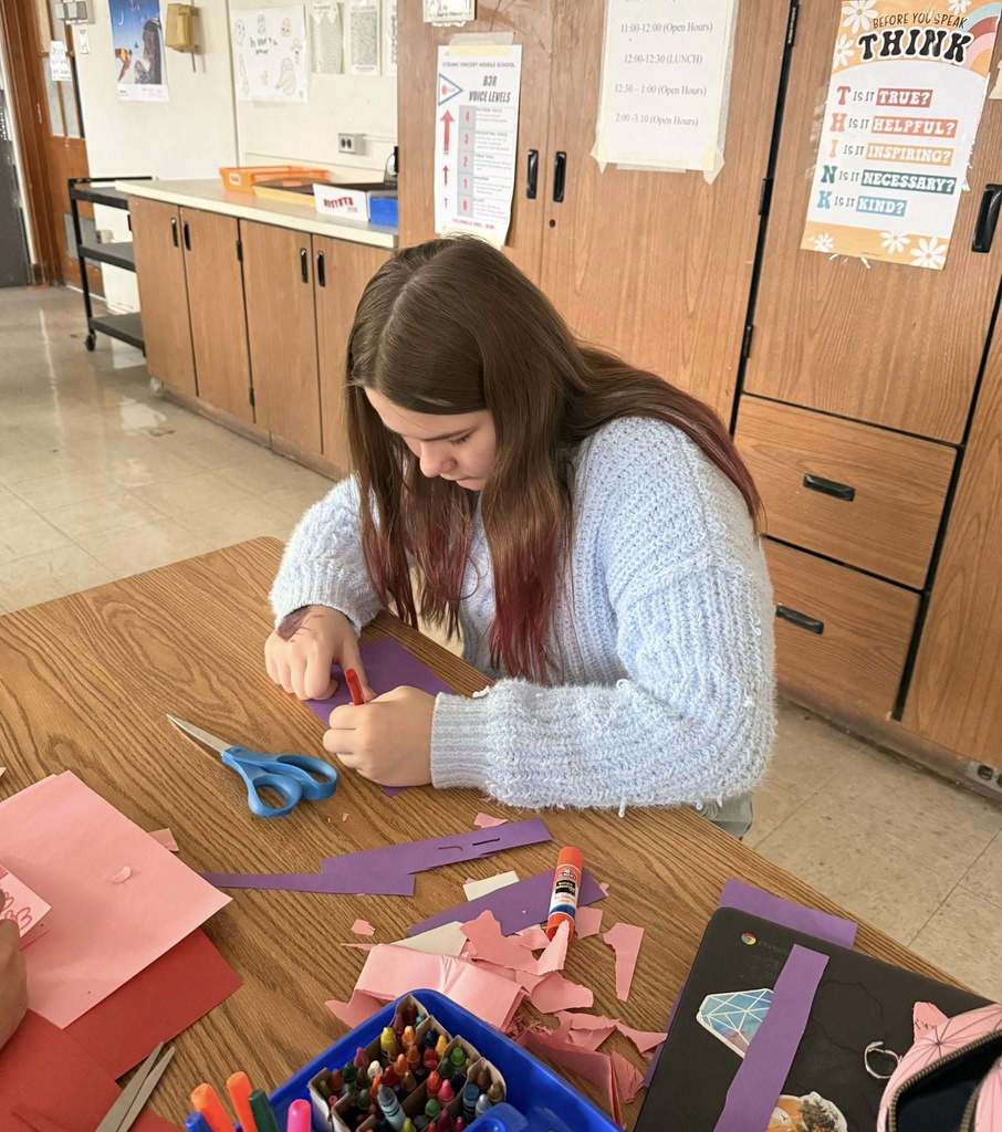 Student doing a craft in class.  