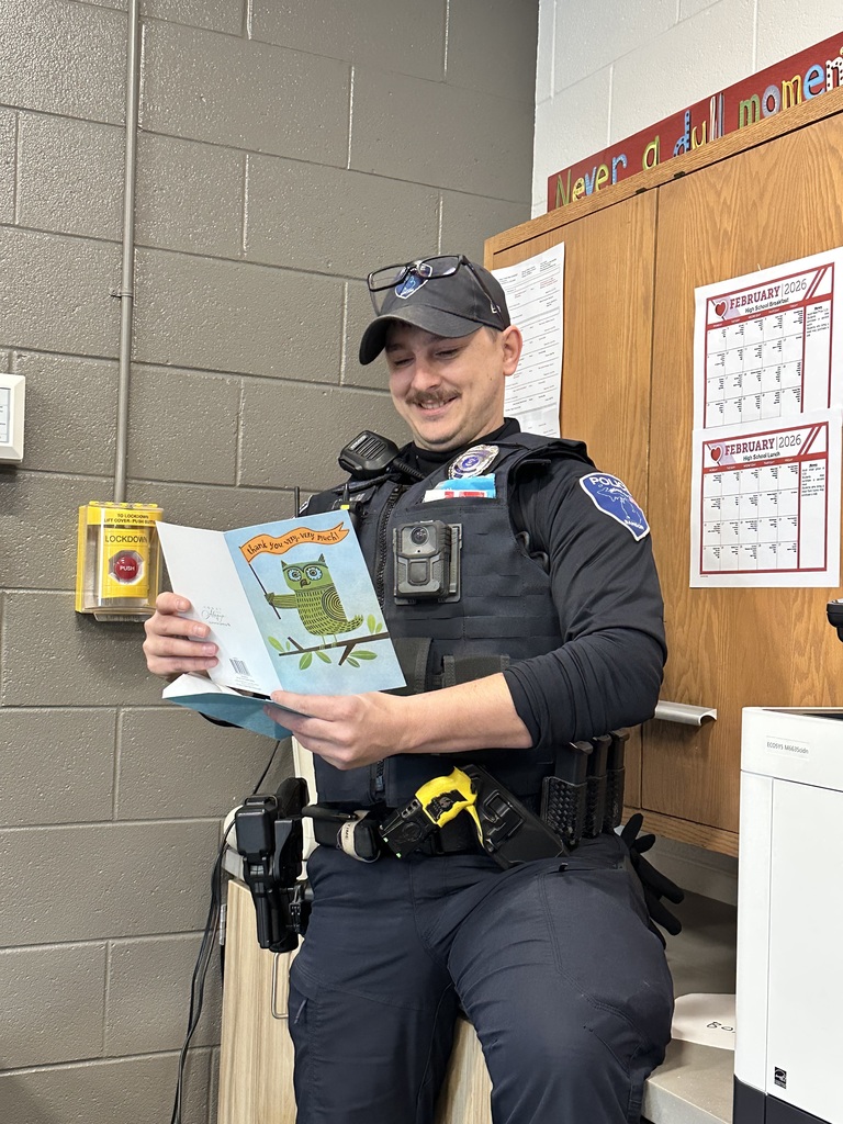 Cop reading card.