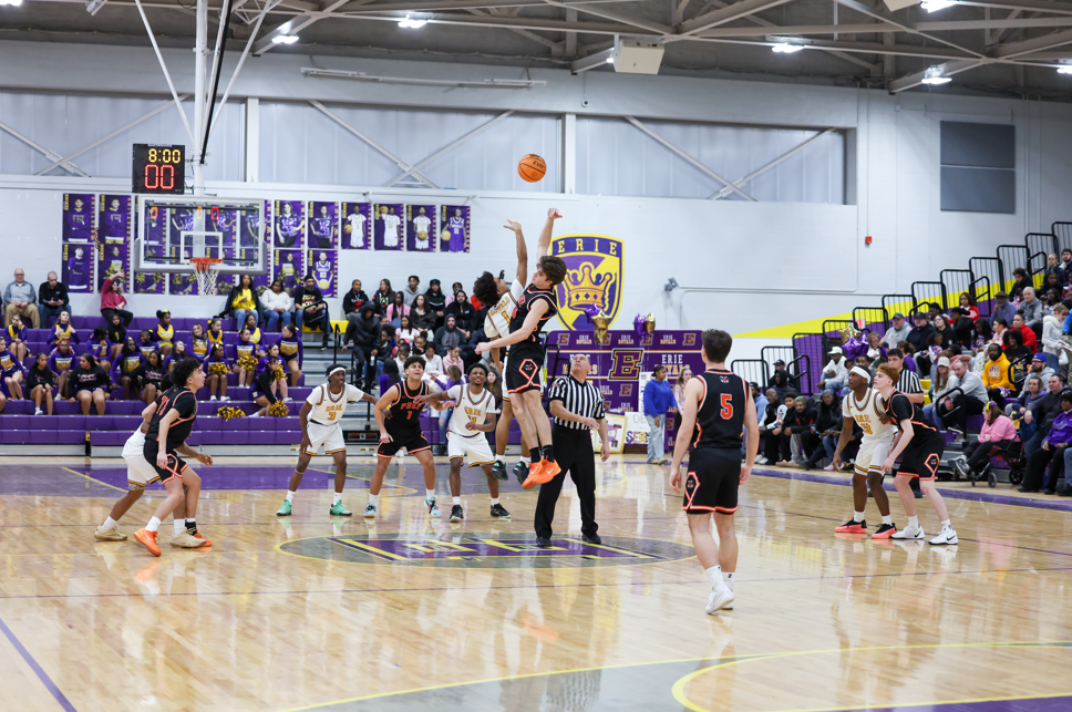 Boys playing basketball.