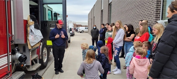 preschoolers with fire fighters