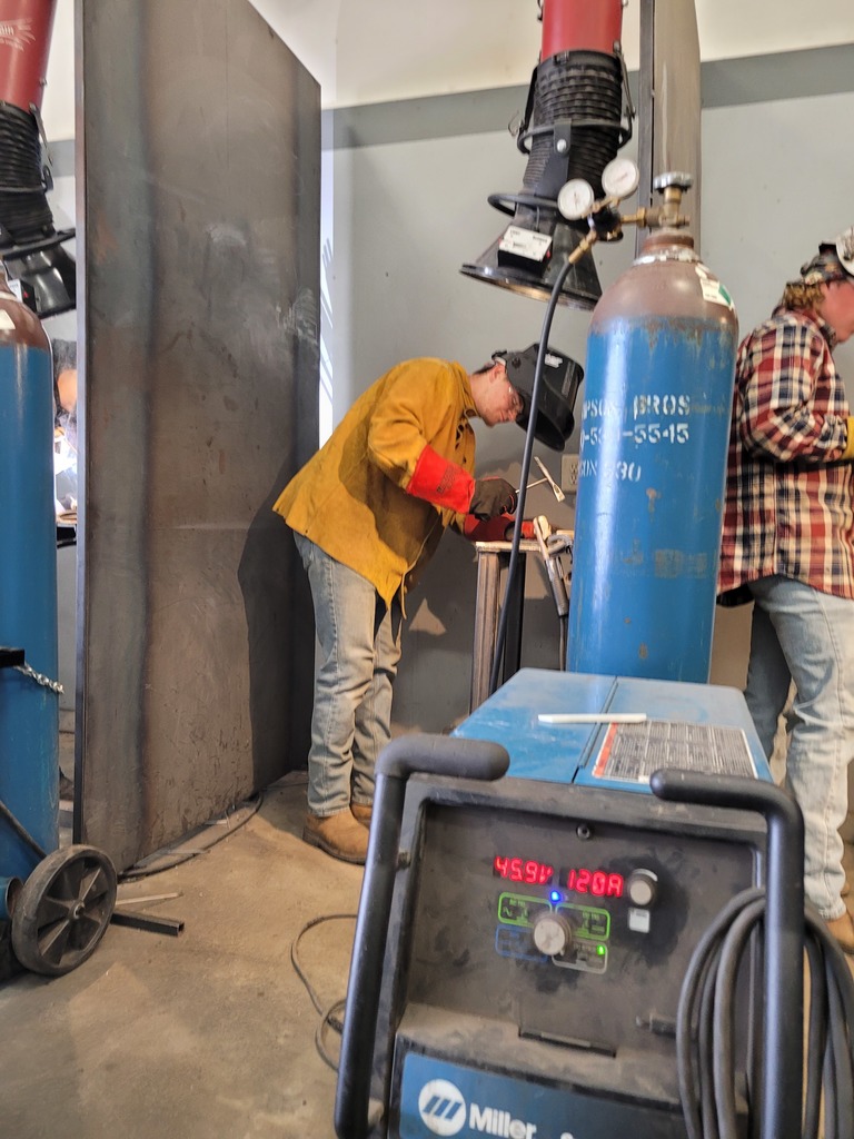 student welding