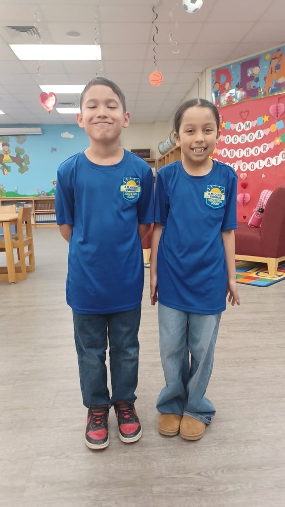 Students with school uniform royal blue top and blue jeans