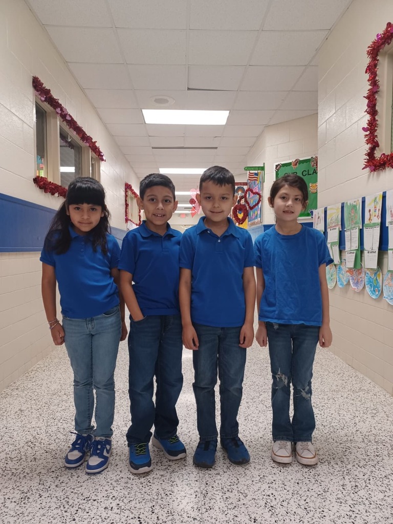 Students with school uniform royal blue top and blue jeans