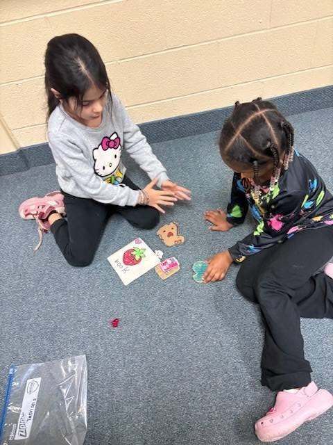 Two students working on a class assignment together.