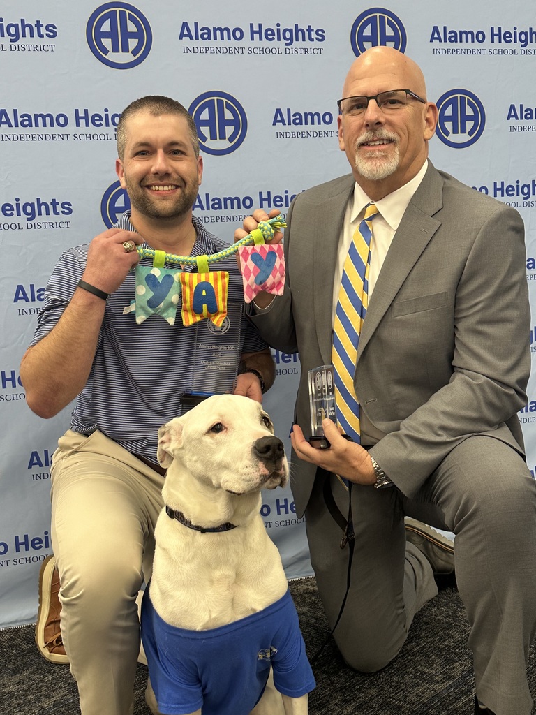 District Teacher of the Year poses with Principal and Service Dog 