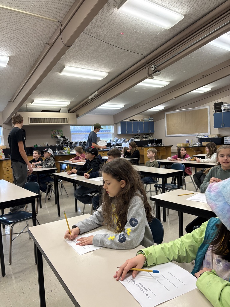 HS students teaching 4th grade chemistry lesson