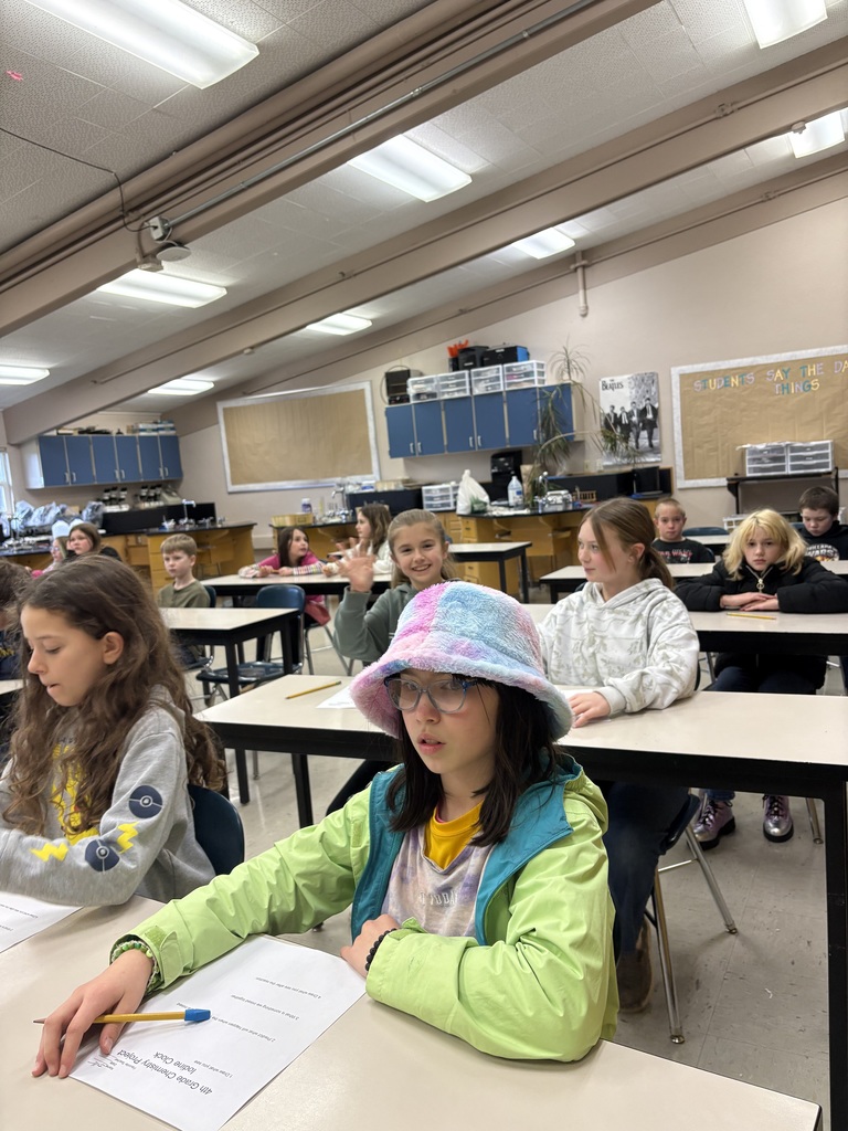 HS students teaching 4th grade chemistry lesson