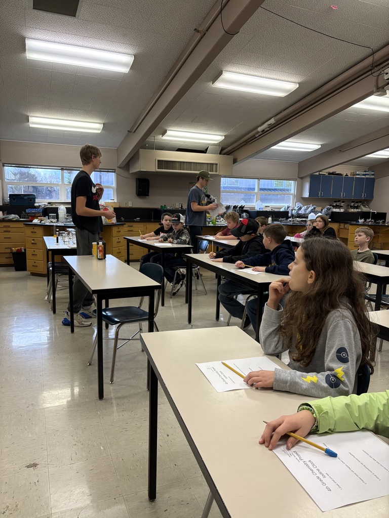 HS students teaching 4th grade chemistry lesson