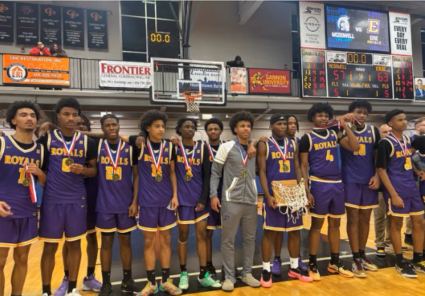 A team photo of the Erie High Royals Boys Basketball team after they won the D10 championship.