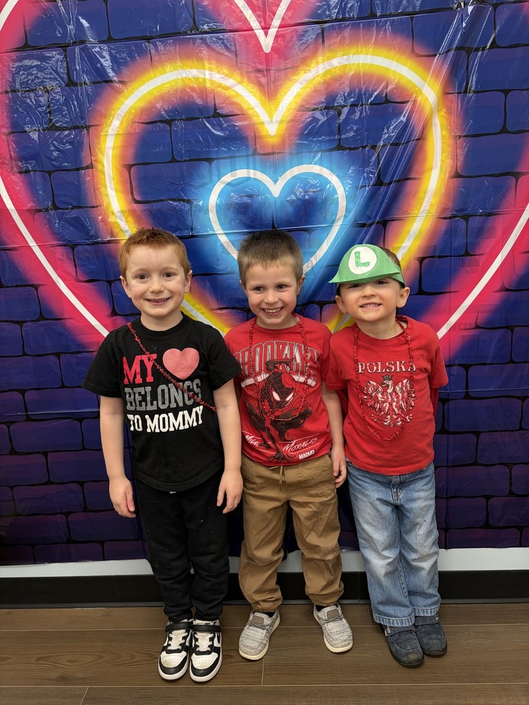 3 students smiling