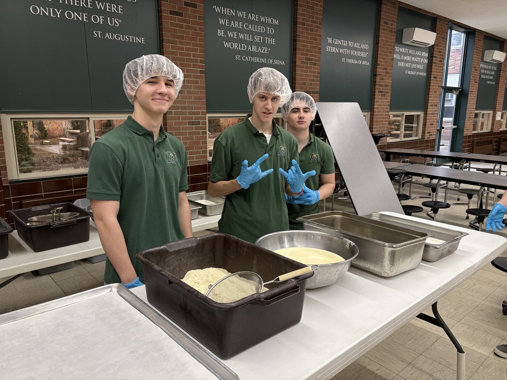 Students voluntering for the fish fry.