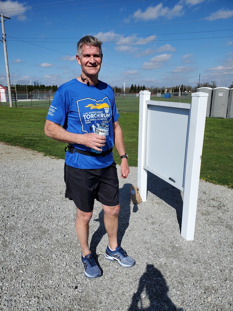 DARE Officer Dan Rittenhouse works out with staff to prepared for a  5K race.