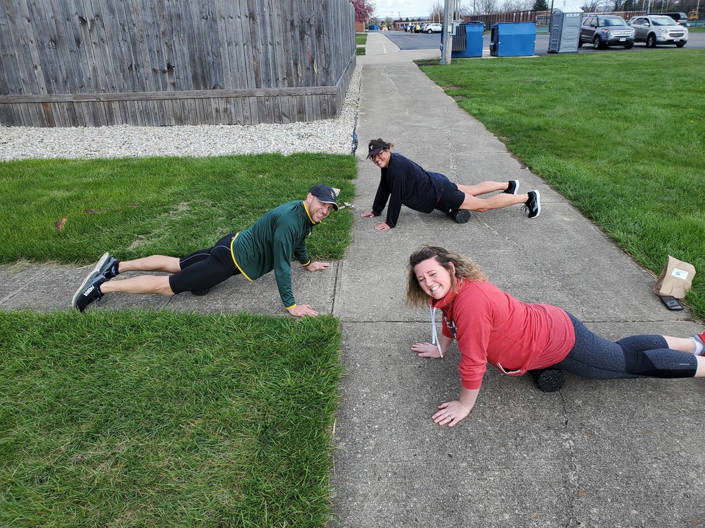 Three staff members workout at the first group session to prepare for the Relay for Life.