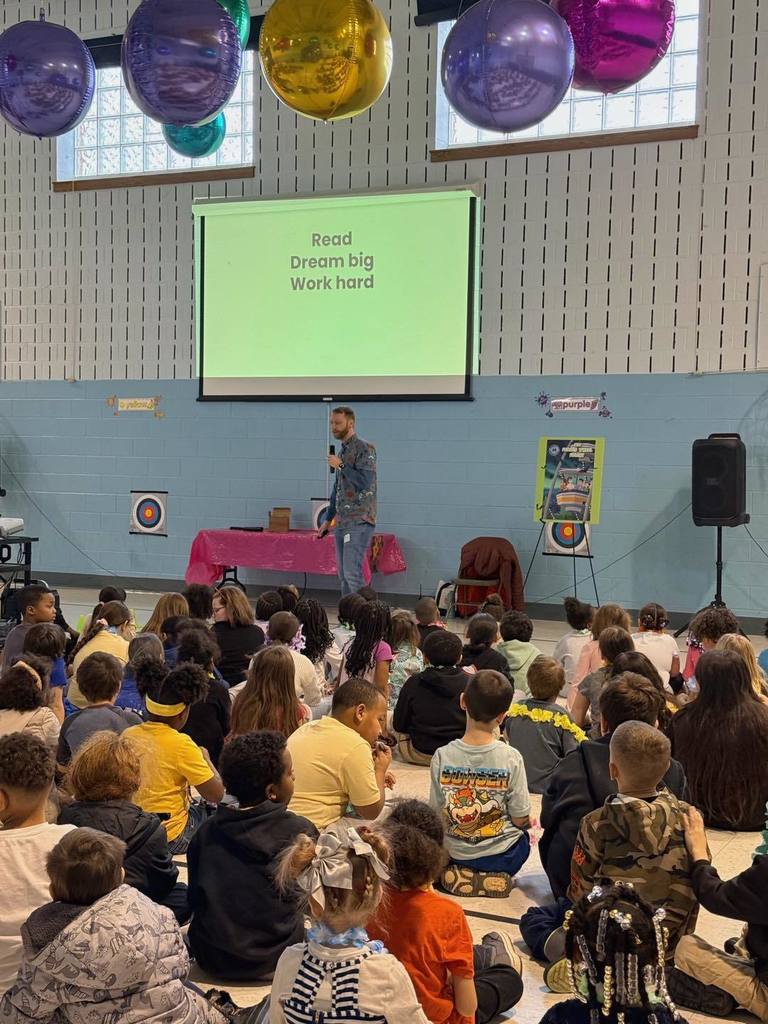  David Gorman speaking to kids.