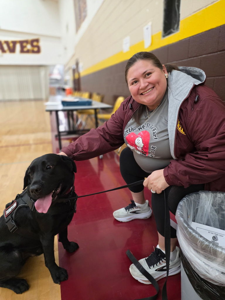 coach with therapy dog