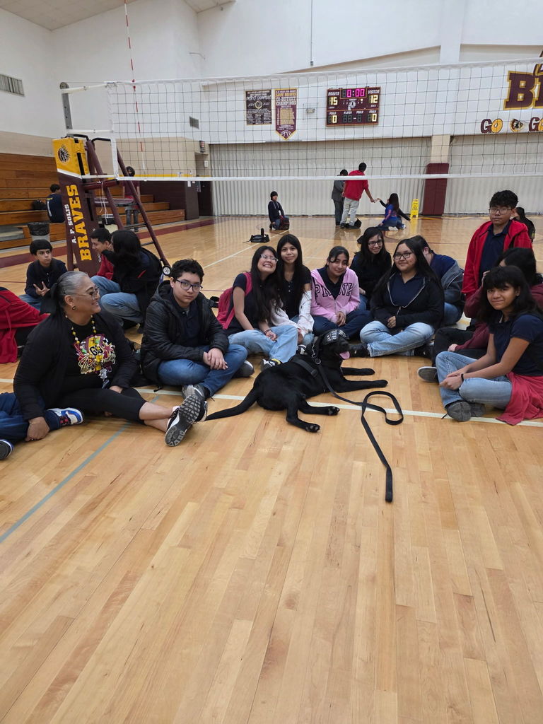 Students with therapy dog 8