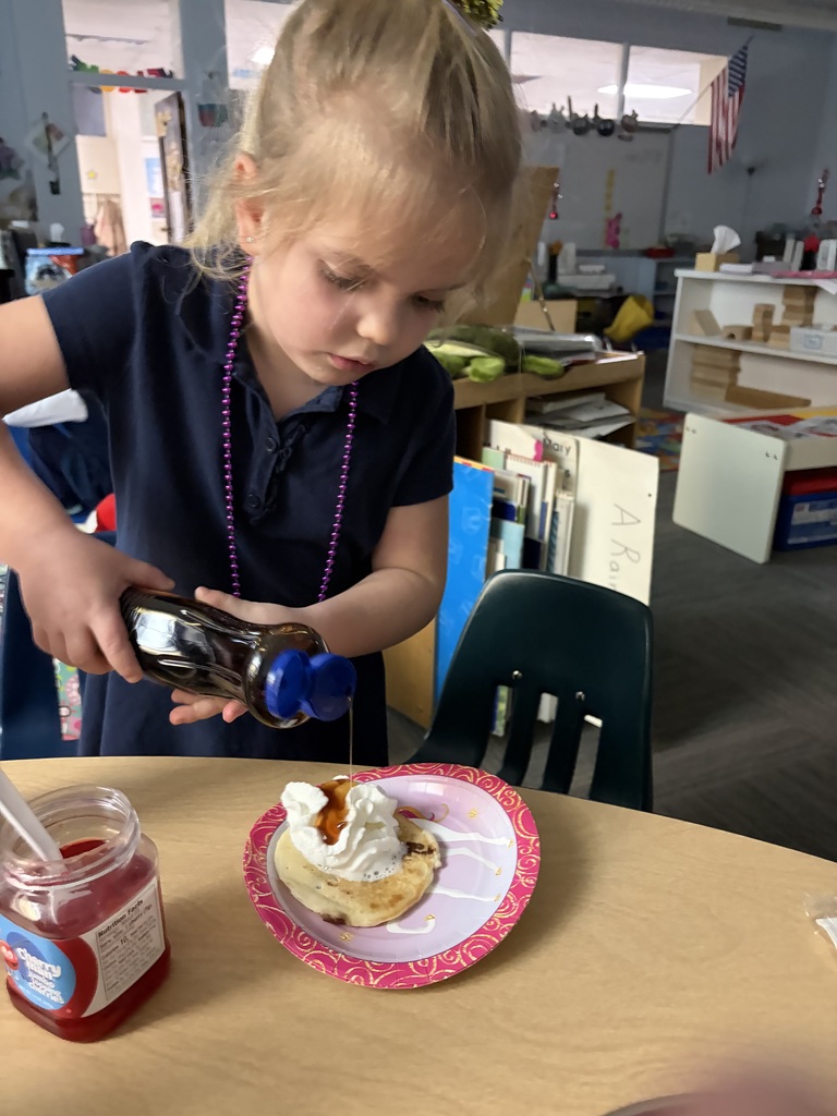 Putting toppings on pancakes