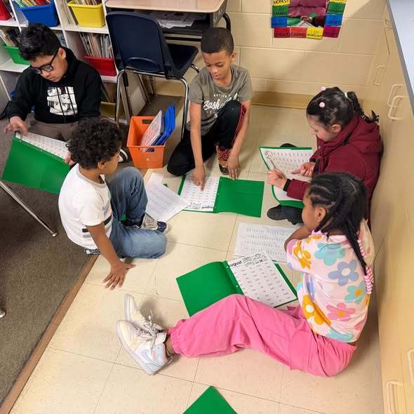 Students doing an assignment in class.