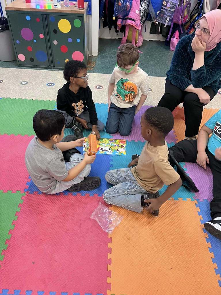 Students putting together a puzzle. 