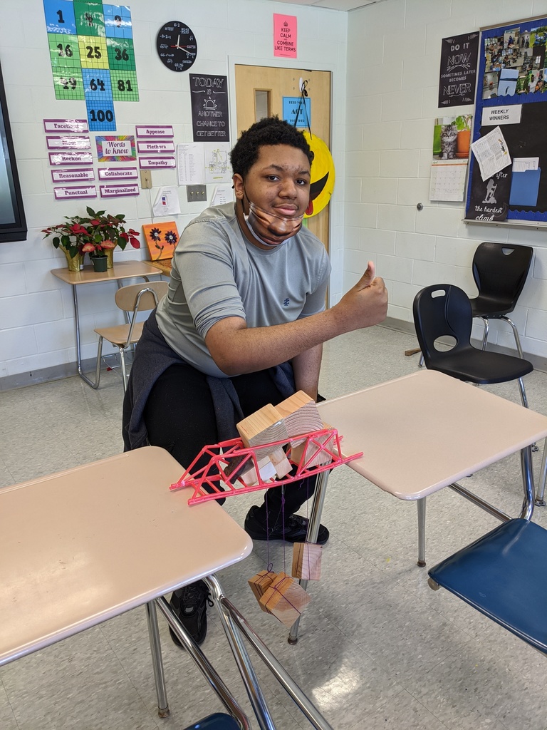 Student winning bridge competition. 