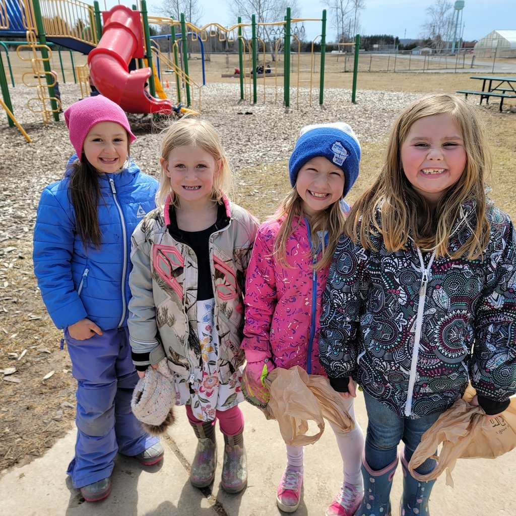 Florence Elementary students cleaning up the playground during recess