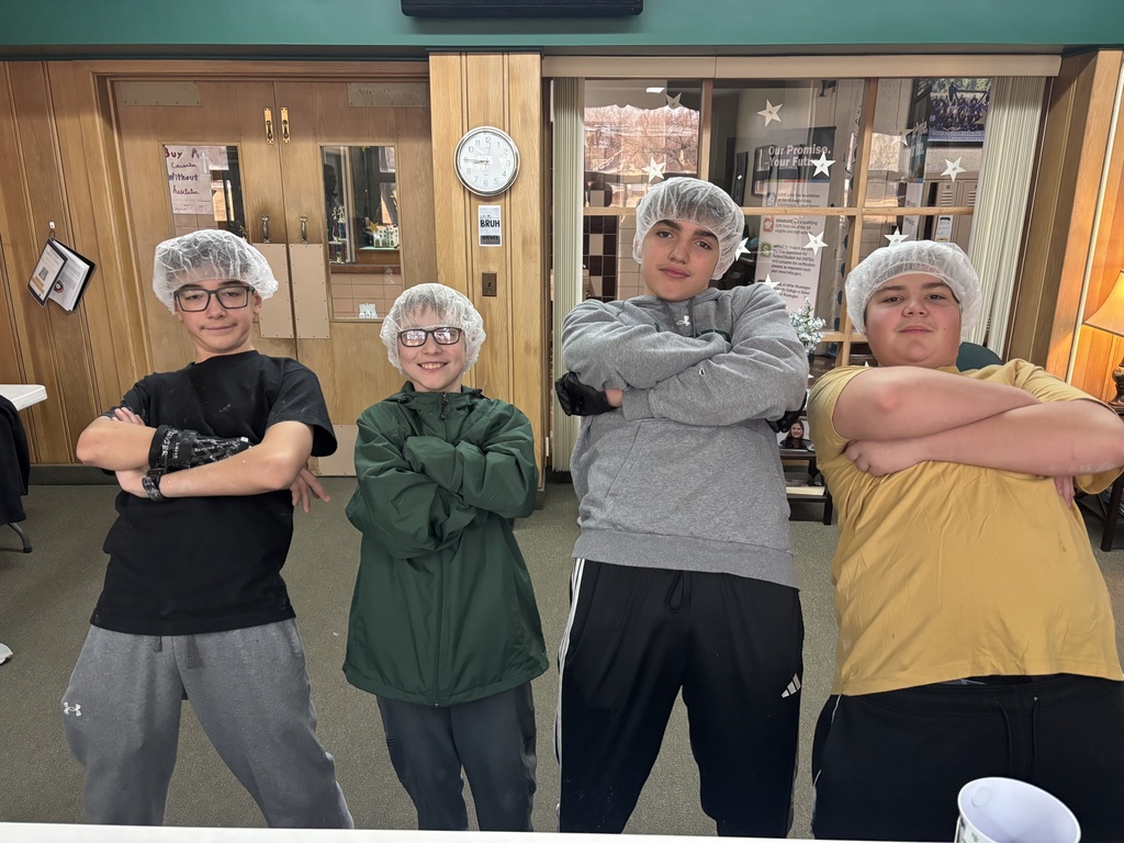Boys getting prepared to bread the fish
