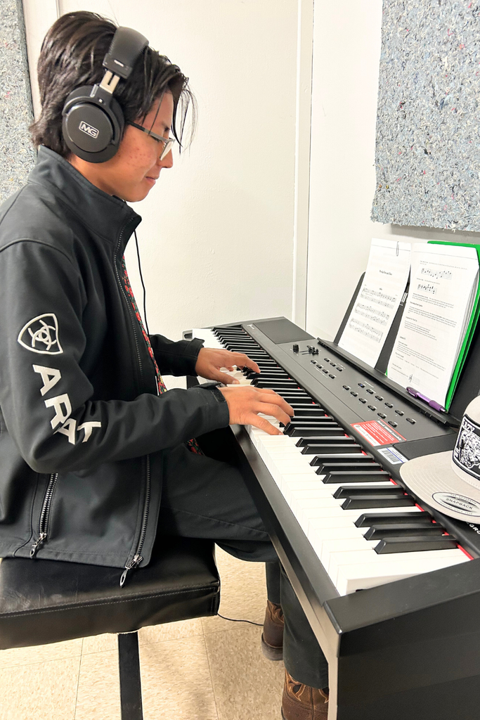 Boy playing piano