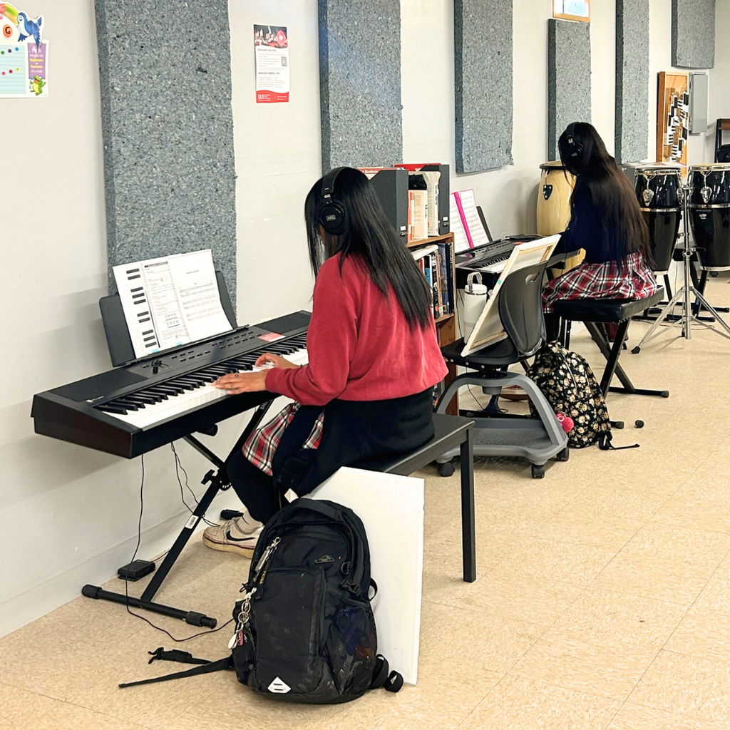 Piano class is playing piano