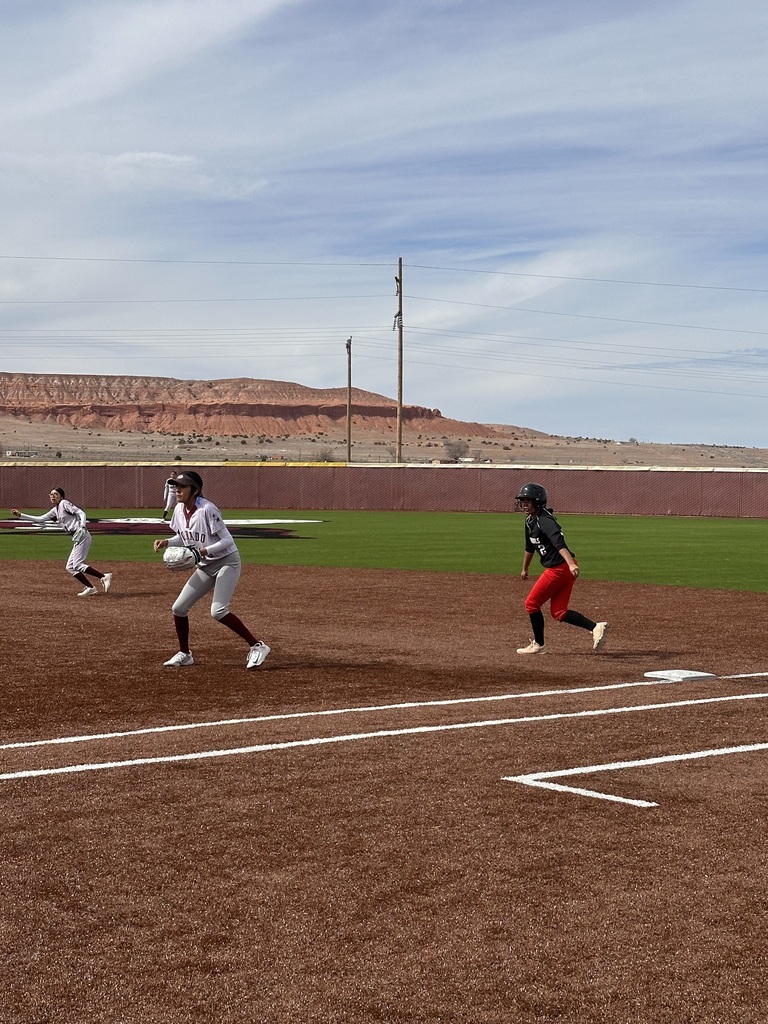 Runner on first base takes a lead off the base 