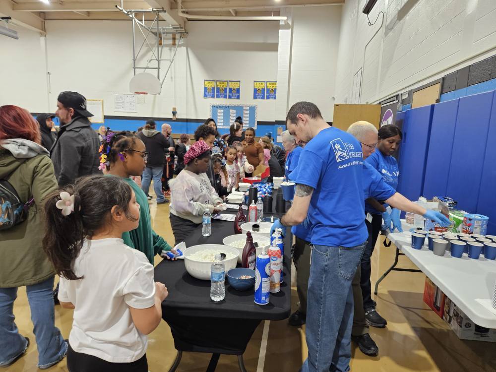 Students waiting to get a sweet treat. 