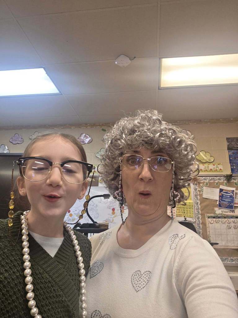 Two individuals dressed as elderly individuals. 