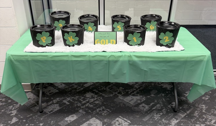 The image shows 8 buckets for students to bring spare change to donate to Southern Elementary as a fundraiser sponsored by the PTO